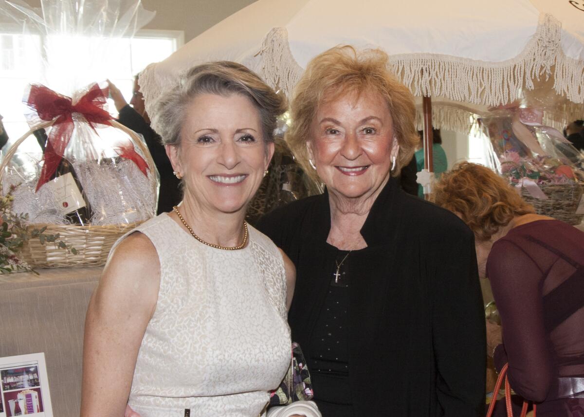 Shelly Atwood and Jan Landstrom support the Global Center for Women and Justice at the Priceless Luncheon.