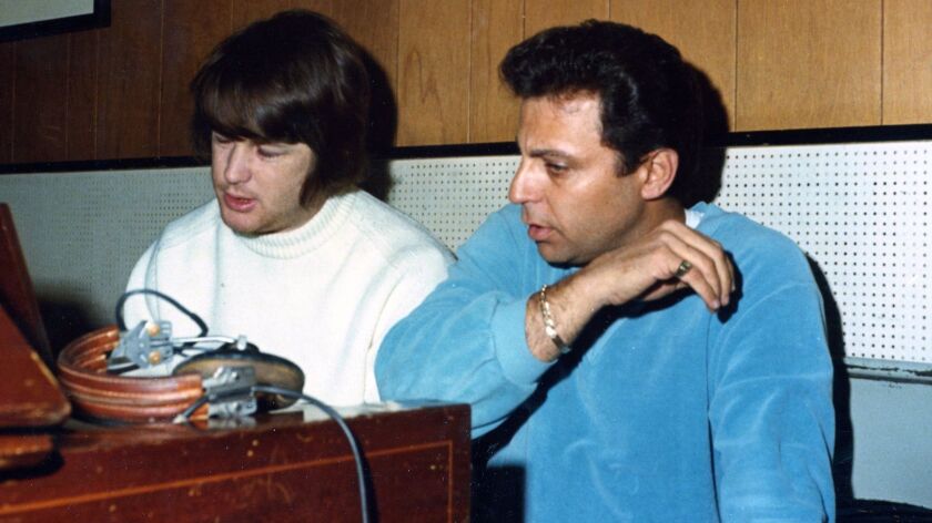 Brian Wilson, left, in a recording studio in the 1960s working with "Wrecking Crew" drummer Hal Blaine