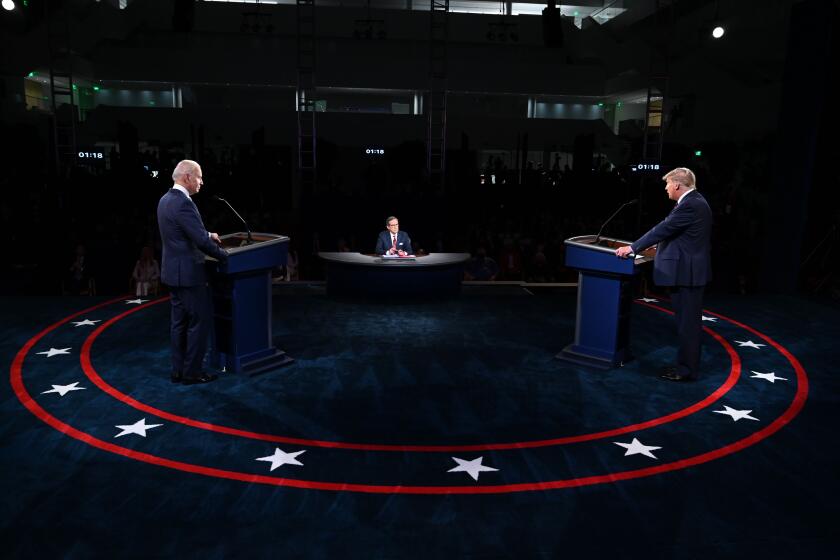 US President Donald Trump (R) and Democratic presidential candidate Joe Biden take part in the first presidential debate at Case Western Reserve University and Cleveland Clinic in Cleveland, Ohio, on September 29, 2020. (Photo by olivier DOULIERY / AFP) (Photo by OLIVIER DOULIERY/AFP via Getty Images)