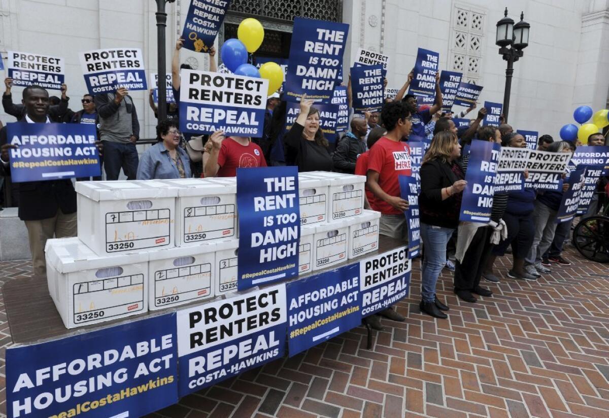 Boxes containing over 588,000 voter signatures for a statewide ballot measure to repeal Costa-Hawkins are shown at a press conference on Monday, April 23, 2018, in Los Angeles. The Costa Hawkins Rental Act of 1995 prohibits rent control in most of California.