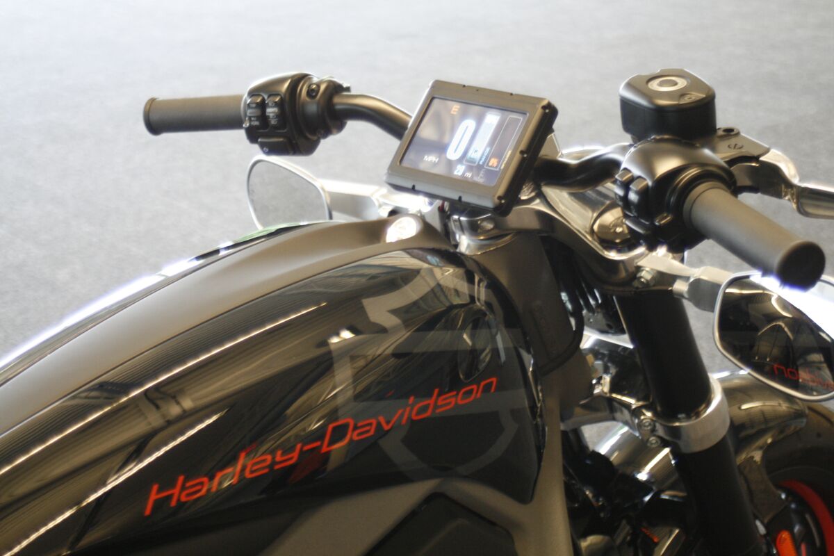 FILE - This June 18, 2014 photo shows the control screen on Harley-Davidson's new electric motorcycle, at the company's research facility in Wauwatosa, Wis. Special purpose acquisition company AEA-Bridges Impact Corp. is buying Harley-Davidson's LiveWire unit in a deal that will makes the division the first publicly traded electric motorcycle company in the U.S. (AP Photo/M.L. Johnson, file)