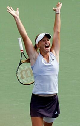 Melanie Oudin, 17, of the United States celebrates her 1-6, 7-6 (2), 6-3 upset victory over Nadia Petrova of Russia to reach the quarterfinals of the U.S. Open tennis tournament in New York.