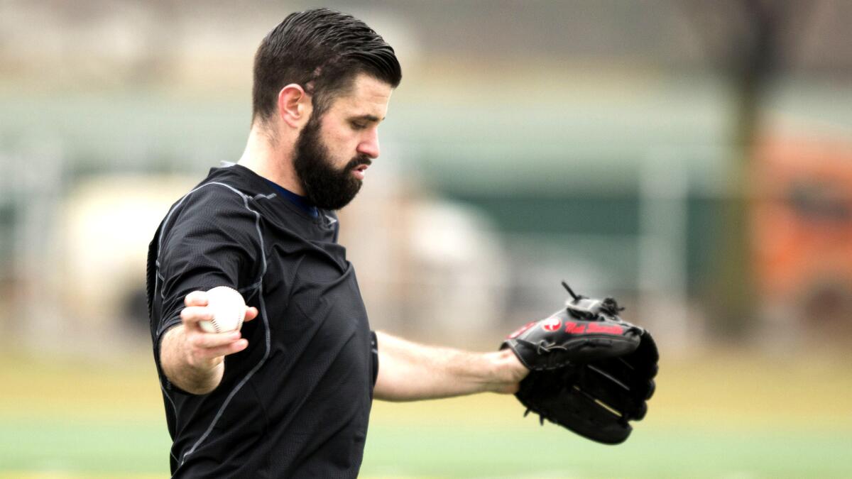 Angels pitcher Matt Shoemaker, who continues his recovery and rehabilitation after getting hit in the head by a line drive last season, works out at Wayne State University in Detroit on Jan. 17.