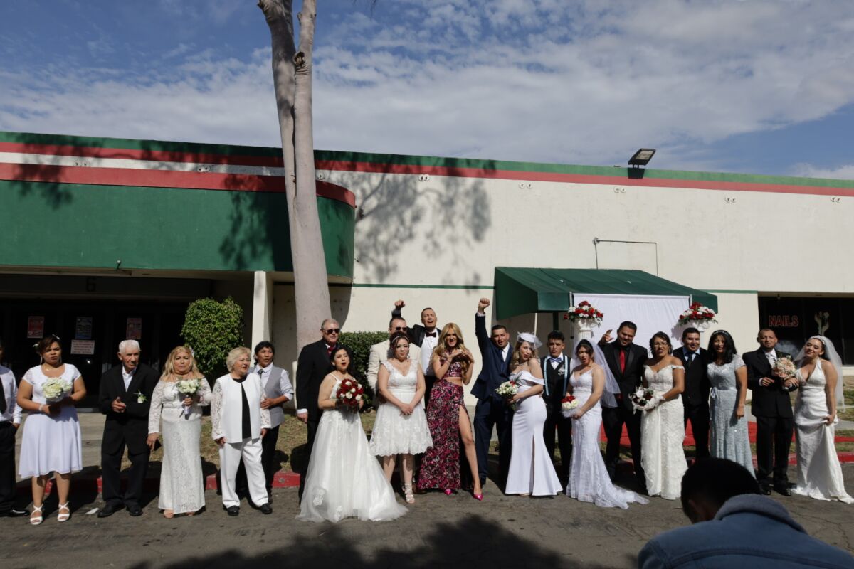 The Anaheim Marketplace sponsored the weddings of 13 couples on Feb. 12.