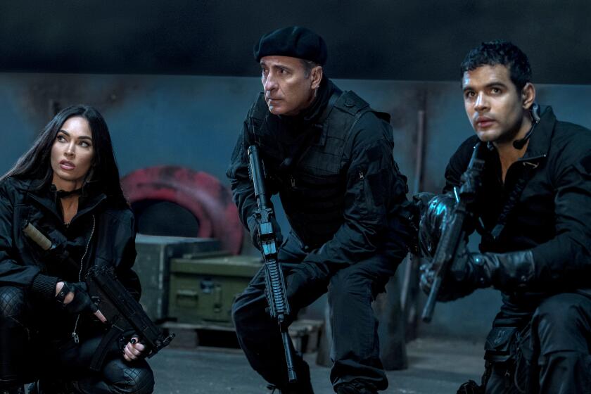 Megan Fox as Gina, Andy Garcia as Marsh and Jacob Scipio as Galan in The Expendables 4.