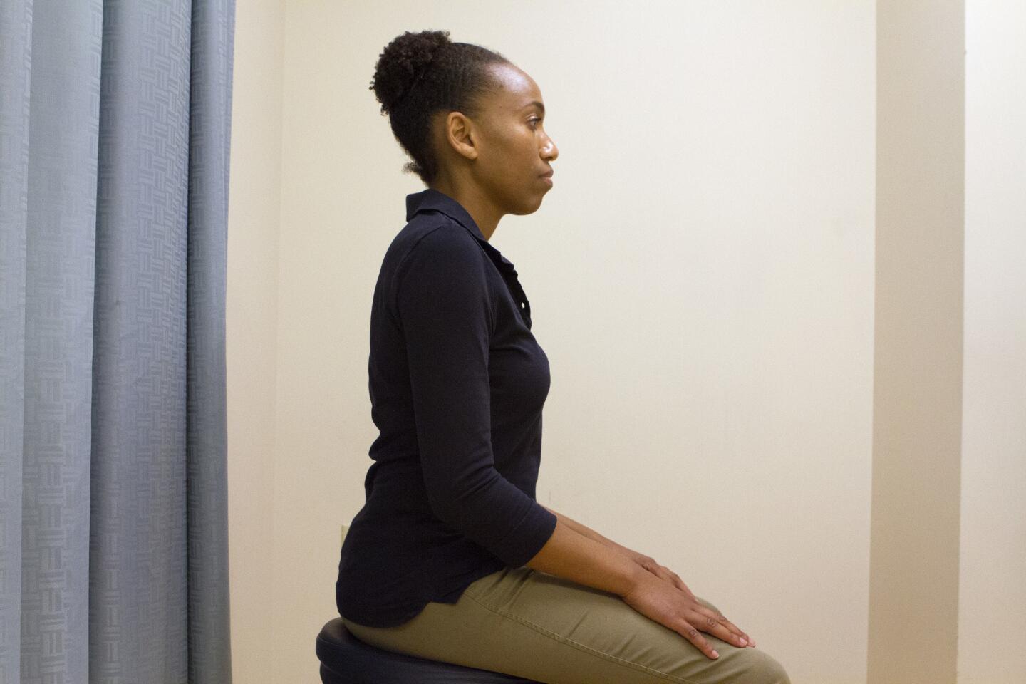 UCLA physical therapist Keri Pegram shows what good posture looks like.