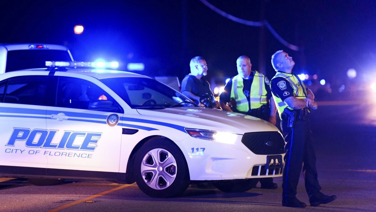 Authorities near the scene Wednesday in Florence, S.C., where several law enforcement officers were shot, one fatally.