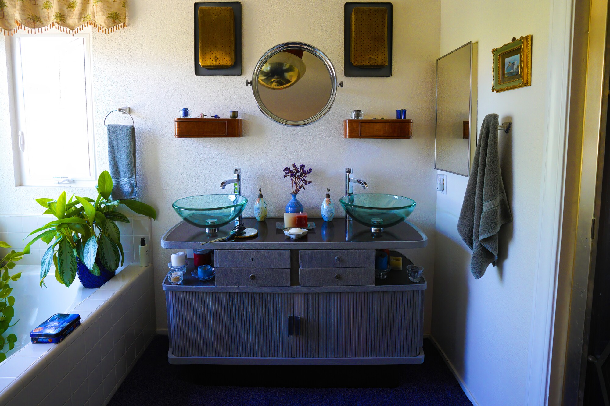 A first class dining room serving station from the 1952 Italian ocean liner Augustus is now a bathroom vanity.
