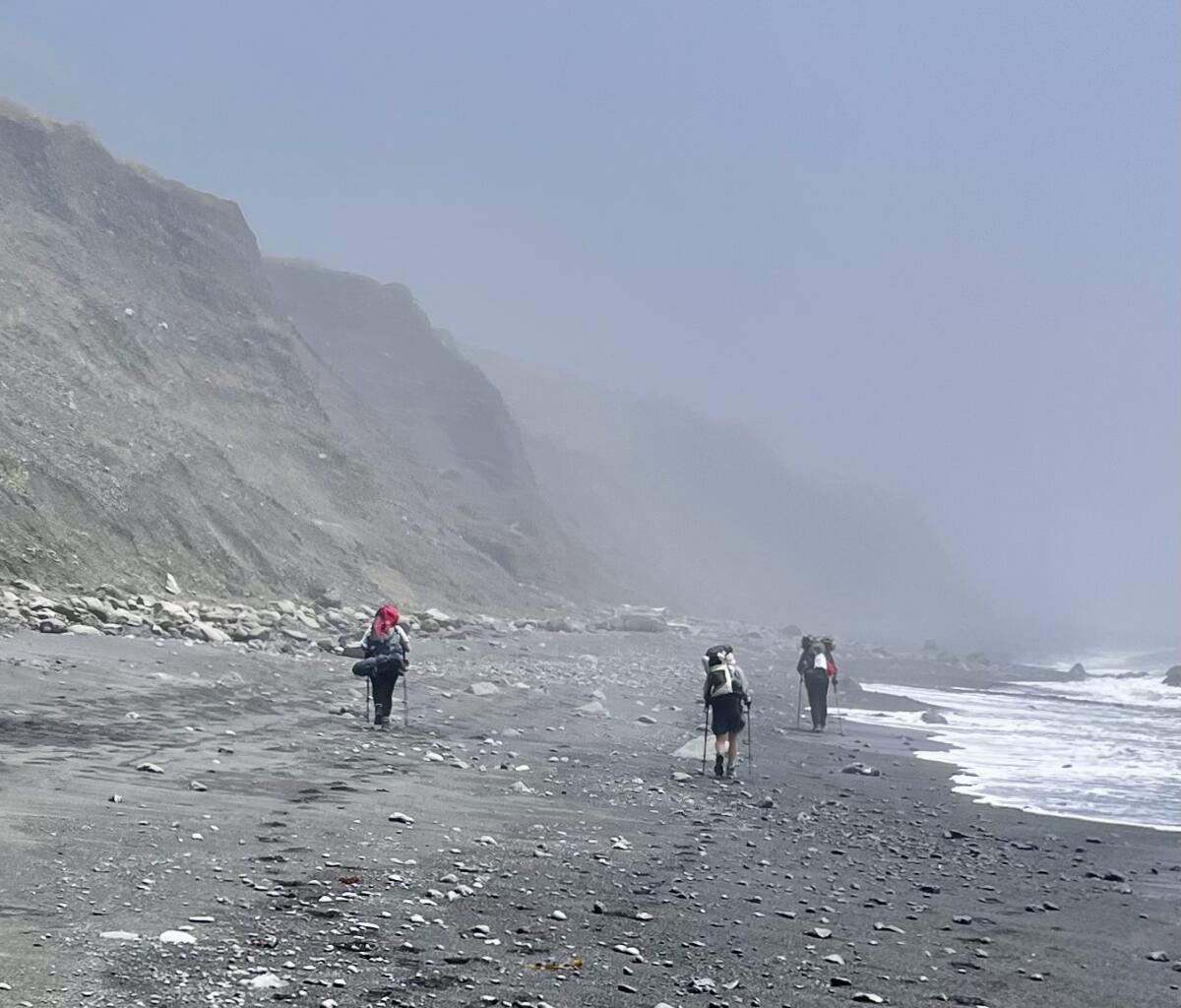 Backpackers walk along the Lost Coast in 2022.
