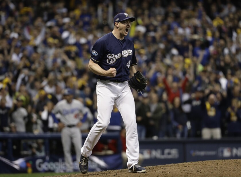 Milwaukee Brewers relief pitcher Corey Knebel reacts at the end of Game 1 of the 2018 National League Championship Series.