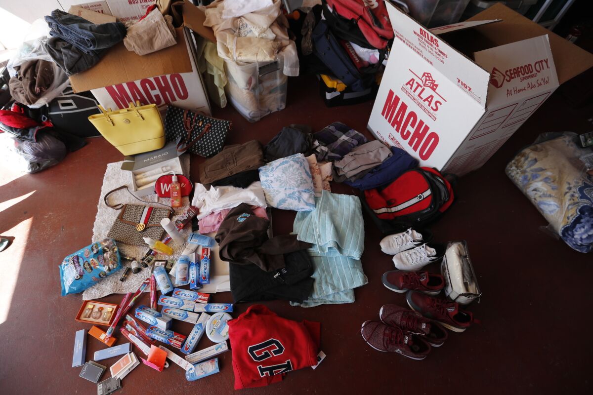 The contents of Amy Guzman's two balikbayan boxes at her home in Long Beach.