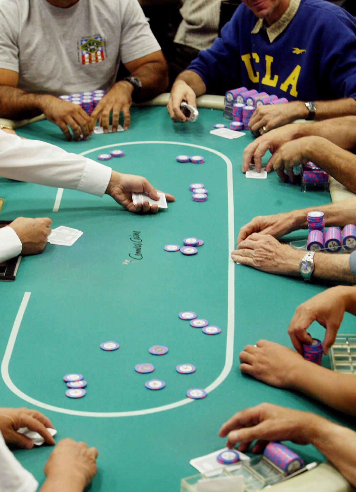 Chips and cards go around the gambling table at the Commerce Casino. The Legislature might look at regulations and taxes involving the gambling industry in the state.