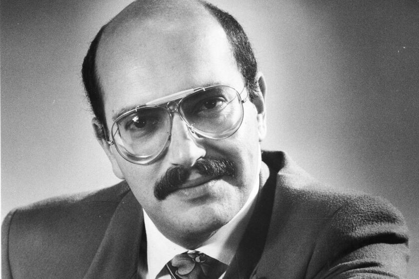 FILE - This Aug. 12, 1982 photo shows private Investigator Jack Palladino. Prosecutors in San Francisco have dropped all charges against two men accused in the murder of Palladino. The San Francisco district attorney's office said it dismissed the case due to a lack of evidence. Police in February 2021 said Palladino died of head injuries after fighting off two men in a car who tried to steal his camera. (Eric Luse/San Francisco Chronicle via AP, File)