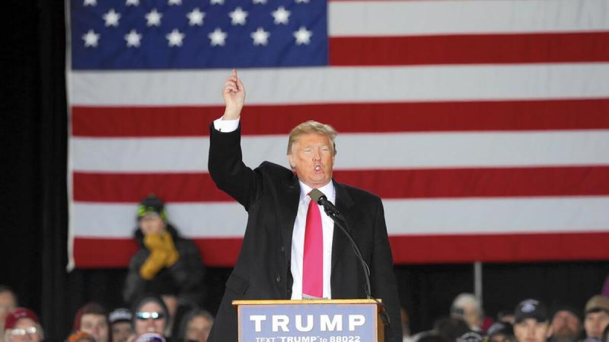 Republican presidential candidate Donald Trump speaks at a campaign rally in a hangar at the Bong Airport in Superior, Wis.