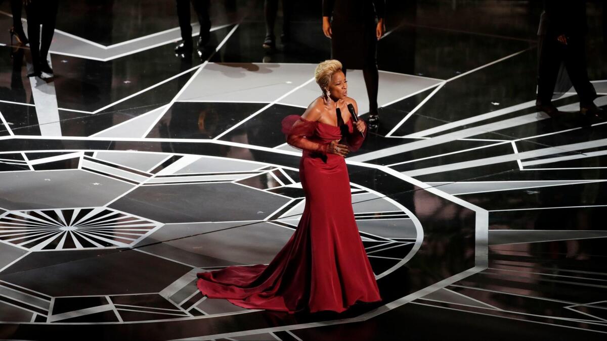 Mary J. Blige performs at the 90th Academy Awards.