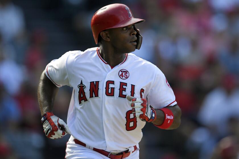 Los Angeles Angels' Justin Upton runs to first as he hits a solo home run during the eighth inning of a baseball game against the Boston Red Sox Sunday, Sept. 1, 2019, in Anaheim, Calif. (AP Photo/Mark J. Terrill)