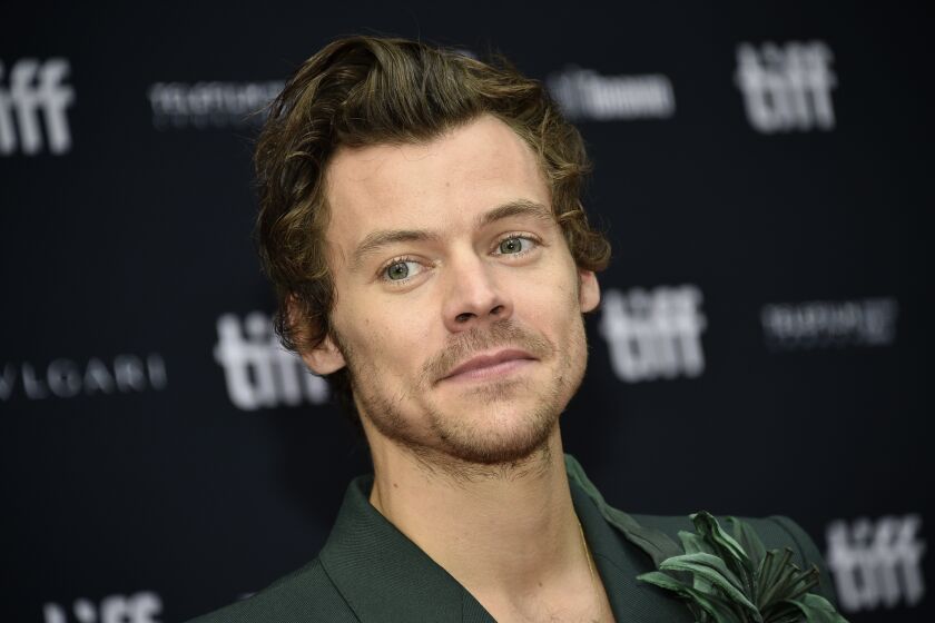 Harry Styles attends the premiere of "My Policeman" at the Princess of Wales Theatre on day four of the Toronto International Film Festival, Sunday, Sept. 11, 2022, in Toronto. (Photo by Evan Agostini/Invision/AP)