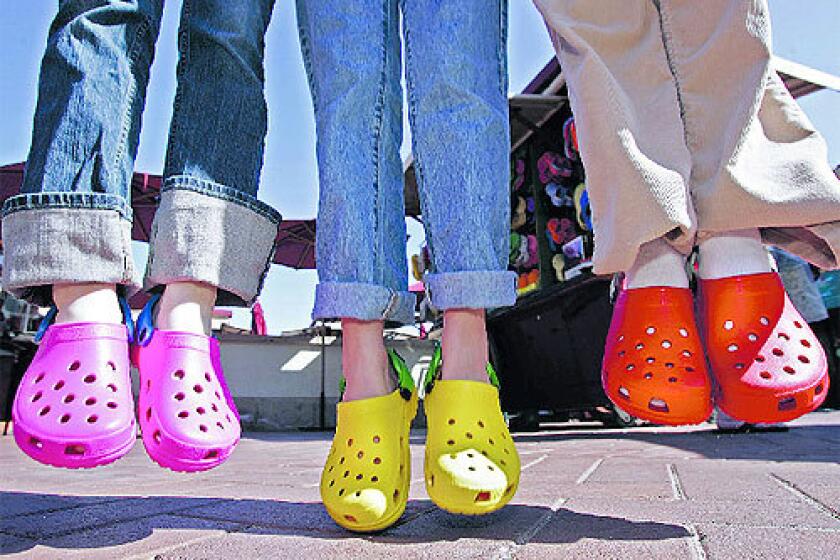 Pink, yellow and red Crocs