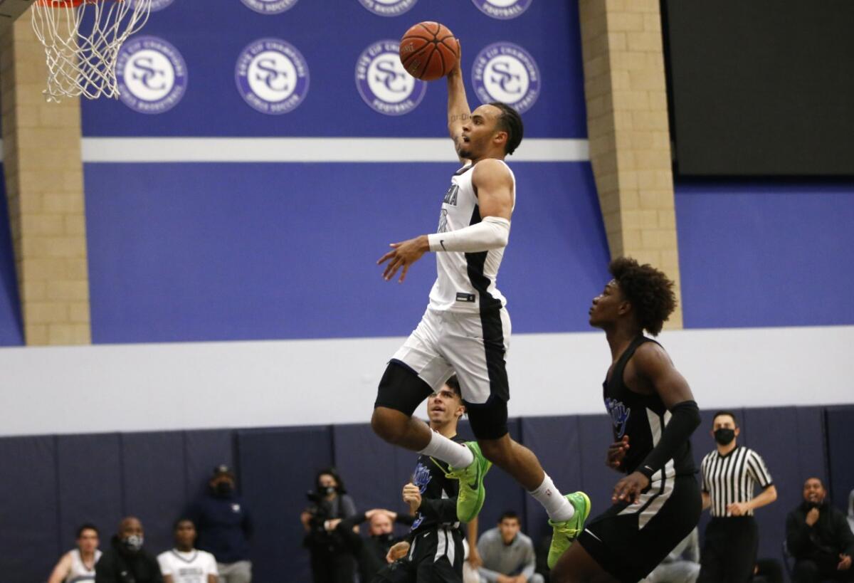 Amari Bailey heads toward one of his multiple dunks in Sierra Canyon's 103-80 win over Culver City.