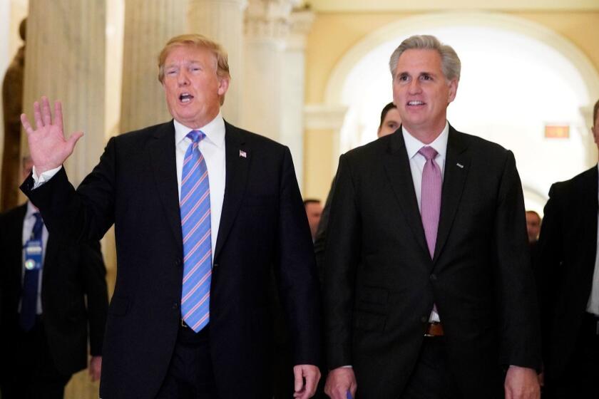 US President Donald Trump (L) walks next to US House Majority Leader Kevin McCarthy (R-CA) after a meeting at the US Capitol with the House Republican Conference in Washington, DC on June 19, 2018. / AFP PHOTO / Mandel NganMANDEL NGAN/AFP/Getty Images ** OUTS - ELSENT, FPG, CM - OUTS * NM, PH, VA if sourced by CT, LA or MoD **