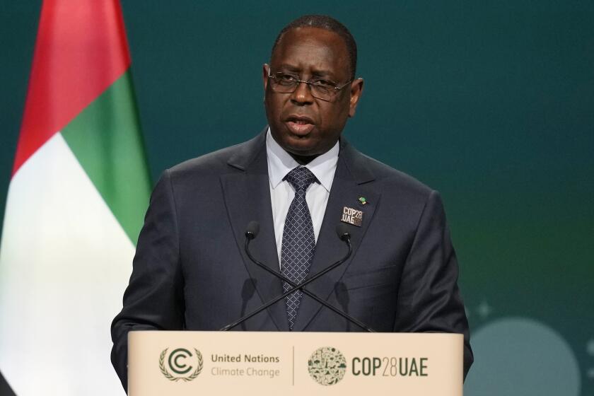 FILE - Senegal's President Macky Sall speaks during a plenary session at the COP28 U.N. Climate Summit, Friday, Dec. 1, 2023, in Dubai, United Arab Emirates. Senegalese President Macky Sall on Saturday, Feb. 3, 2024, postponed presidential elections scheduled for Feb. 25, citing controversies over the disqualification of some candidates and allegations of corruption in election-related cases. (AP Photo/Rafiq Maqbool, File)