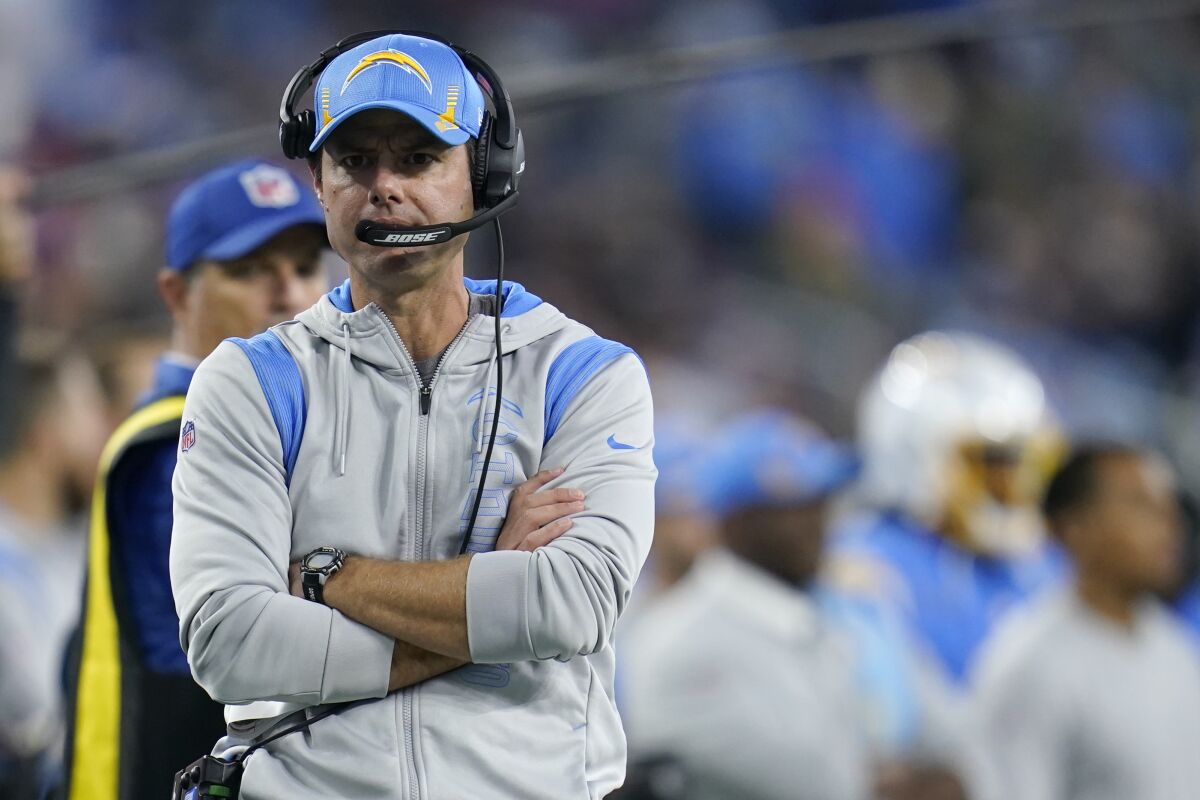 Los Angeles Chargers head coach Brandon Staley looks on during the first half of an NFL football game against the Kansas City Chiefs, Thursday, Dec. 16, 2021, in Inglewood, Calif. (AP Photo/Ashley Landis)