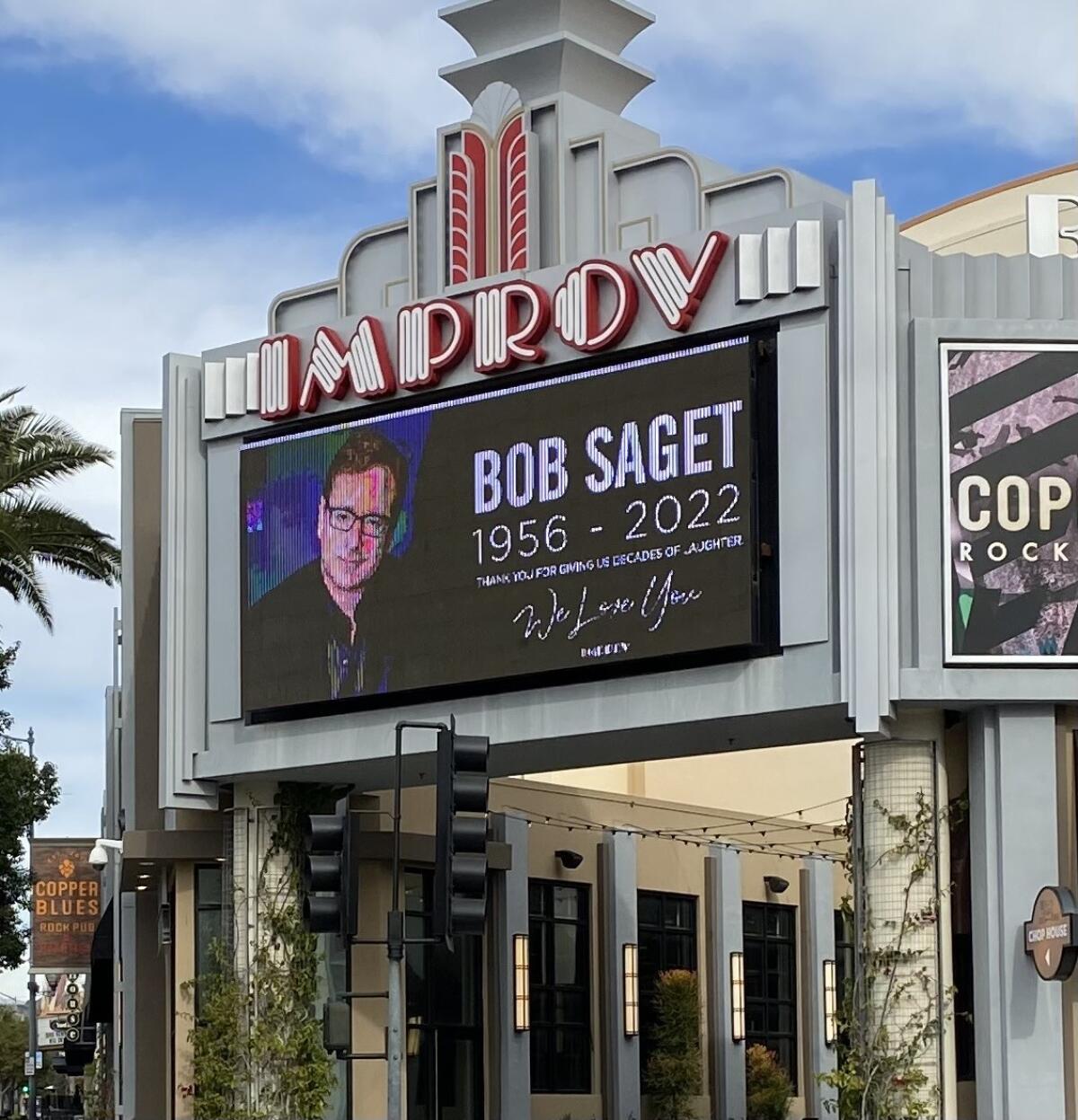 A marquee outside Brea Improv with a picture of Bob Saget and the words "Bob Saget, 1956 - 2022."