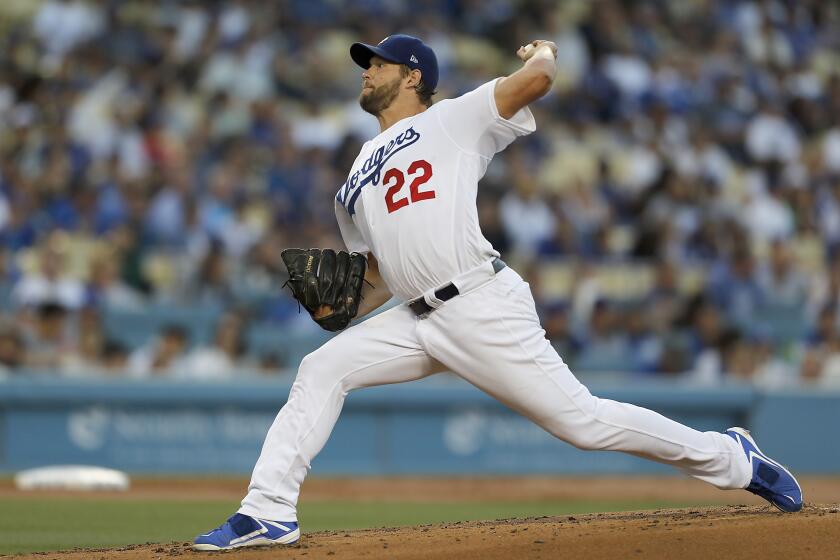 LOS ANGELES, CALIF. - AUG. 1, 2019. Dodgers ace Clayton Kershaw delivers a pitch against the Padres in the second inning Thursday night, Aug. 1, 2019, at Dodger Stadium in Los Angeles. (Luis Sinco/Los Angeles Times)