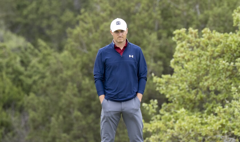Jordan Spieth waits his turn to put during the third round of the 2021 Valero Texas Open golf tournament in San Antonio, Saturday, April 3, 2021. (AP Photo/Michael Thomas)