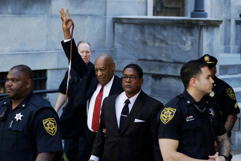 FILE - Bill Cosby gestures as he leaves the Montgomery County Courthouse on April 26, 2018, in Norristown, Pa., after he was convicted of drugging and molesting a woman in the first big celebrity trial of the #MeToo era. Pennsylvania’s highest court has overturned comedian Cosby’s sex assault conviction. The court said Wednesday, June 30, 2021, that they found an agreement with a previous prosecutor prevented him from being charged in the case. (AP Photo/Matt Slocum, File)