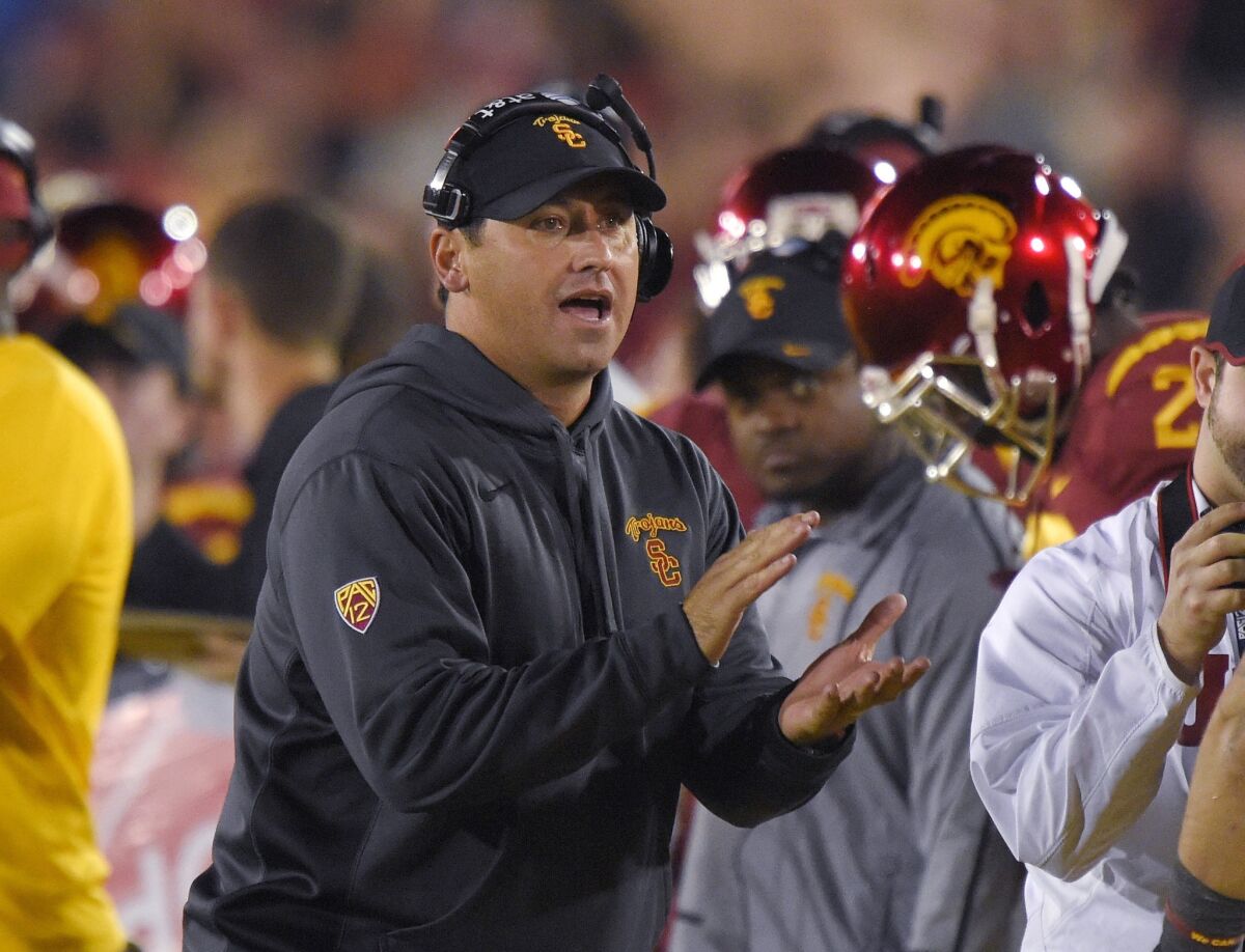 USC Coach Steve Sarkisian claps his hands during the second half of the Trojans' 38-30 win over California on Nov. 13.
