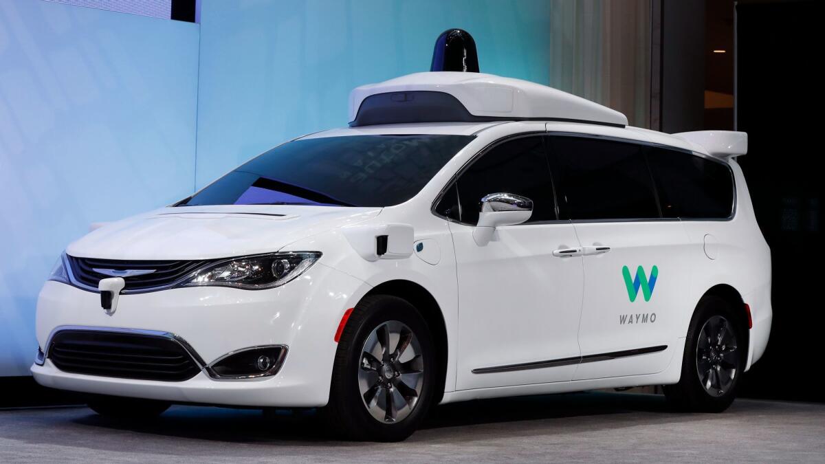 Waymo has outfitted Chrysler Pacifica hybrids with its suite of sensors and radar.