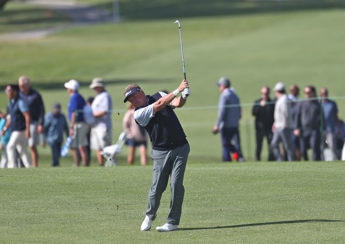 Paul Broadhurst hits it close to the pin on the 18th hole during the Hoag Classic on Friday.