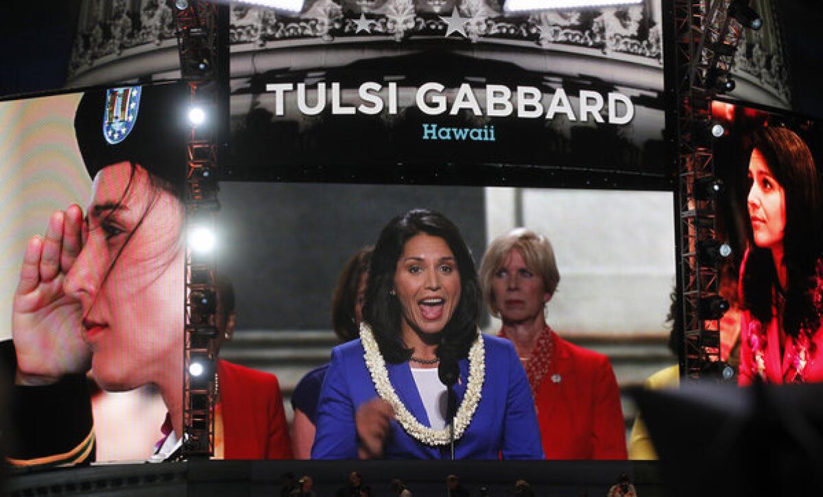 Tulsi Gabbard addresses delegates during the opening night of the Democratic National Convention in 2012. She was elected to Congress from Hawaii.