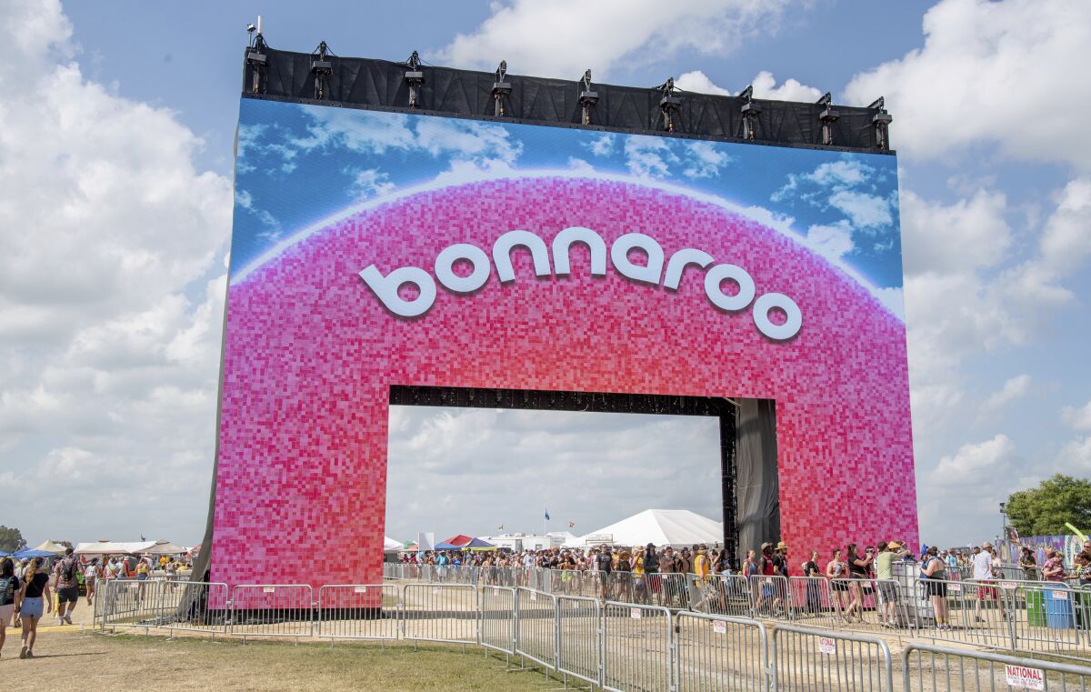 FILE - The Bonnaroo arch appears at the Bonnaroo Music and Arts Festival on June 16, 2019, in Manchester, Tenn. J. Cole, Tool and Stevie Nicks will headline this year’s festival, which takes place in Manchester, Tenn. and is set to return June 16-19 after a two-year hiatus because of the pandemic and weather. (Photo by Amy Harris/Invision/AP, File)