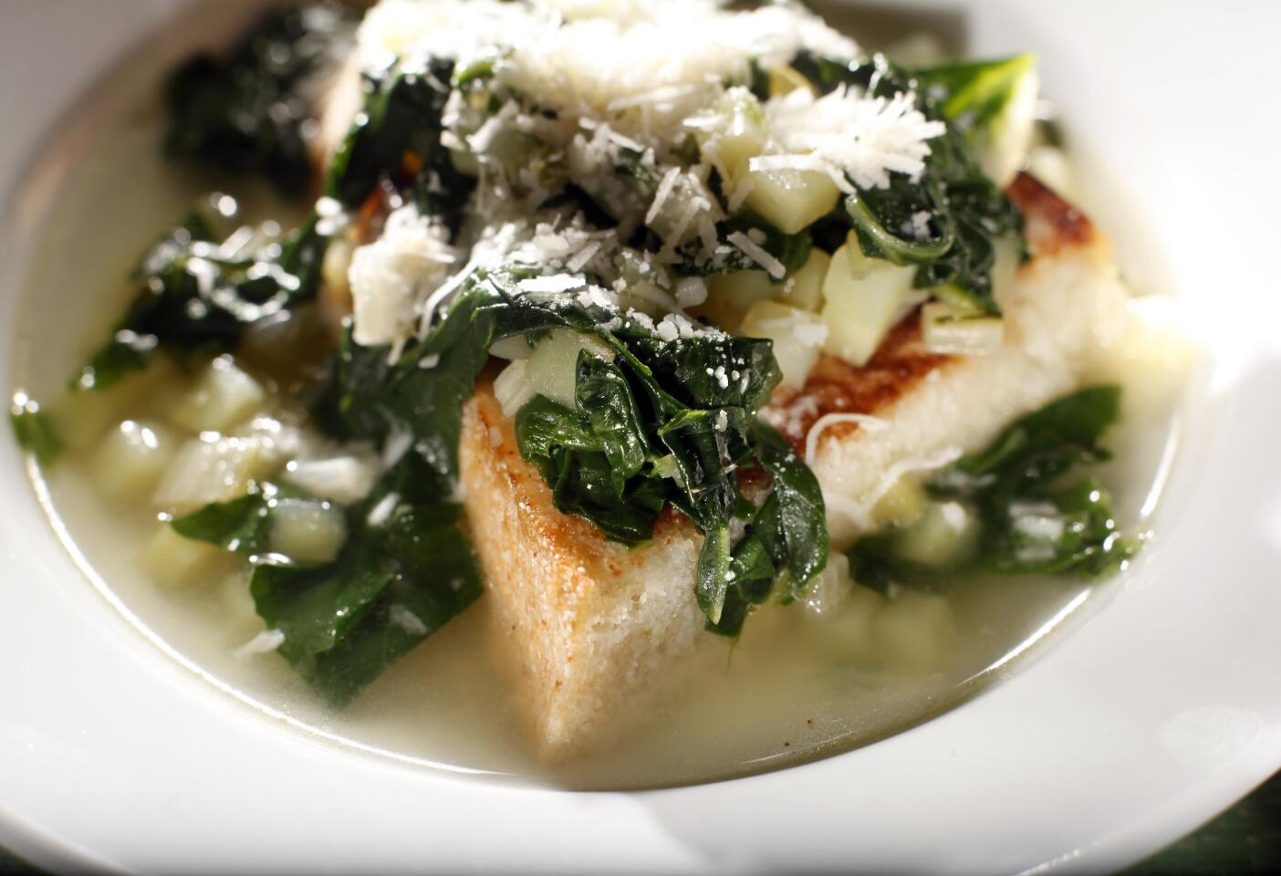 Chard soup on bread with cheese