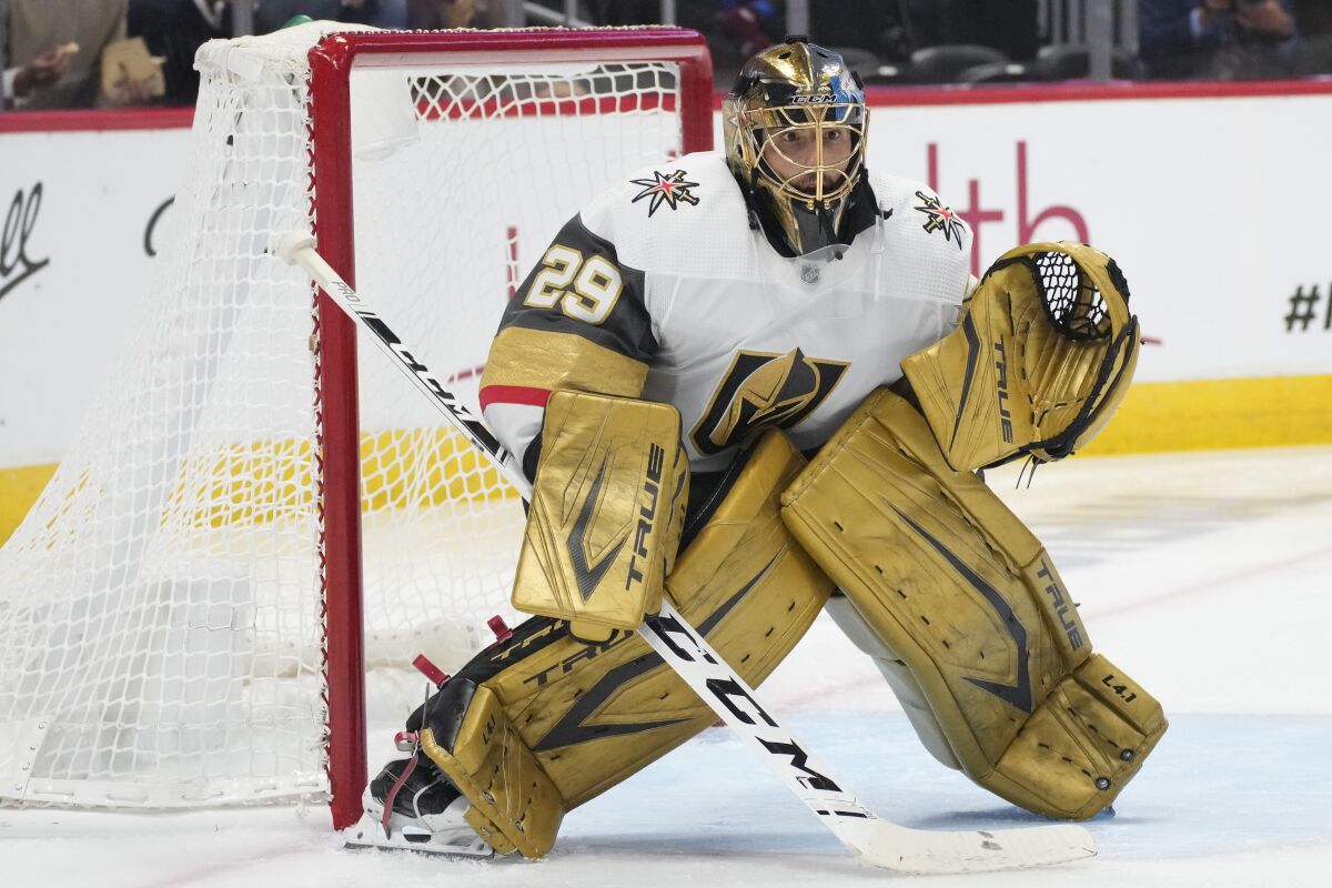 FILE - Vegas Golden Knights goaltender Marc-Andre Fleury (29) plays in the second period of Game 5 of an NHL hockey Stanley Cup second-round playoff series against the Colorado Avalanche in Denver, in this Tuesday, June 8, 2021, file photo. Reigning Vezina Trophy-winning goaltender Marc Andre Fleury has been traded from Vegas to Chicago and is contemplating his future, according to his agent. Allan Walsh tweeted Tuesday, July 27, 2021, that Fleury had still not heard from the Golden Knights about the deal.AP Photo/David Zalubowski, File)