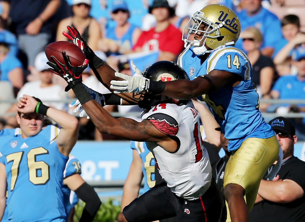 Utah cornerback Brian Allen intercepts a pass intended for UCLA wide receiver Theo Howard in the second half on Oct. 22.