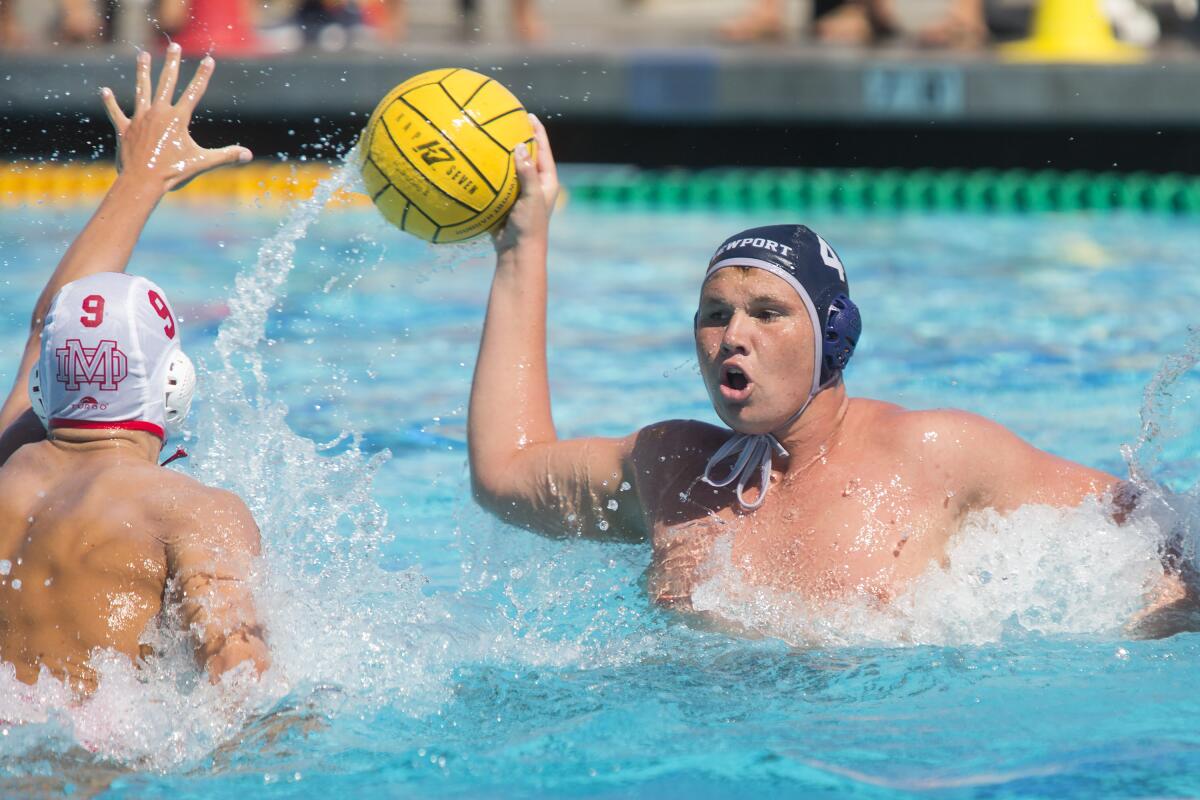 Eli Liechty passes the ball in Newport Harbor's semifinal match at home against Mater Dei in the South Coast Tournament on Saturday.