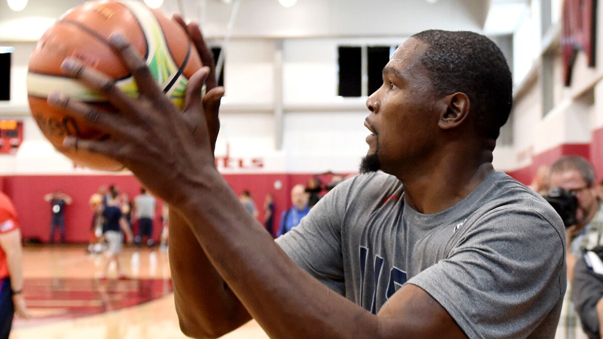 All-Star forward Kevin Durant, working out with Team USA recently, give the Warriors another sharpshooter and another chance to win an NBA title.