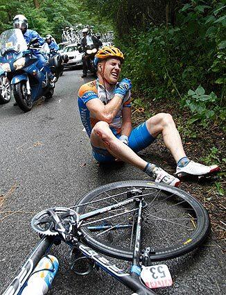 Tyler Farrar of the Colorado-based Garmin-Transitions team grimaces in pain after crashing during Stage 2 of the Tour de France. Farrar fractured his left wrist.