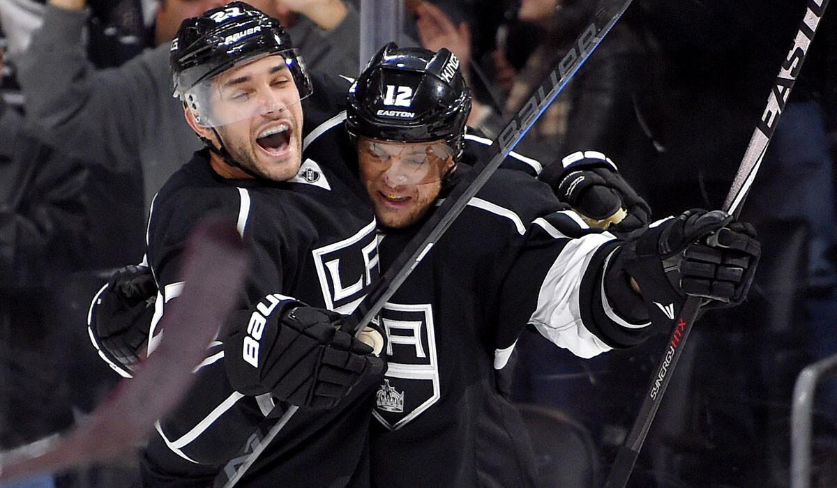 Kings right wing Marian Gaborik celebrates his goal with defenseman Alec Martinez in the second period of a 4-2 victory over the Coyotes on Saturday at Staples Center.