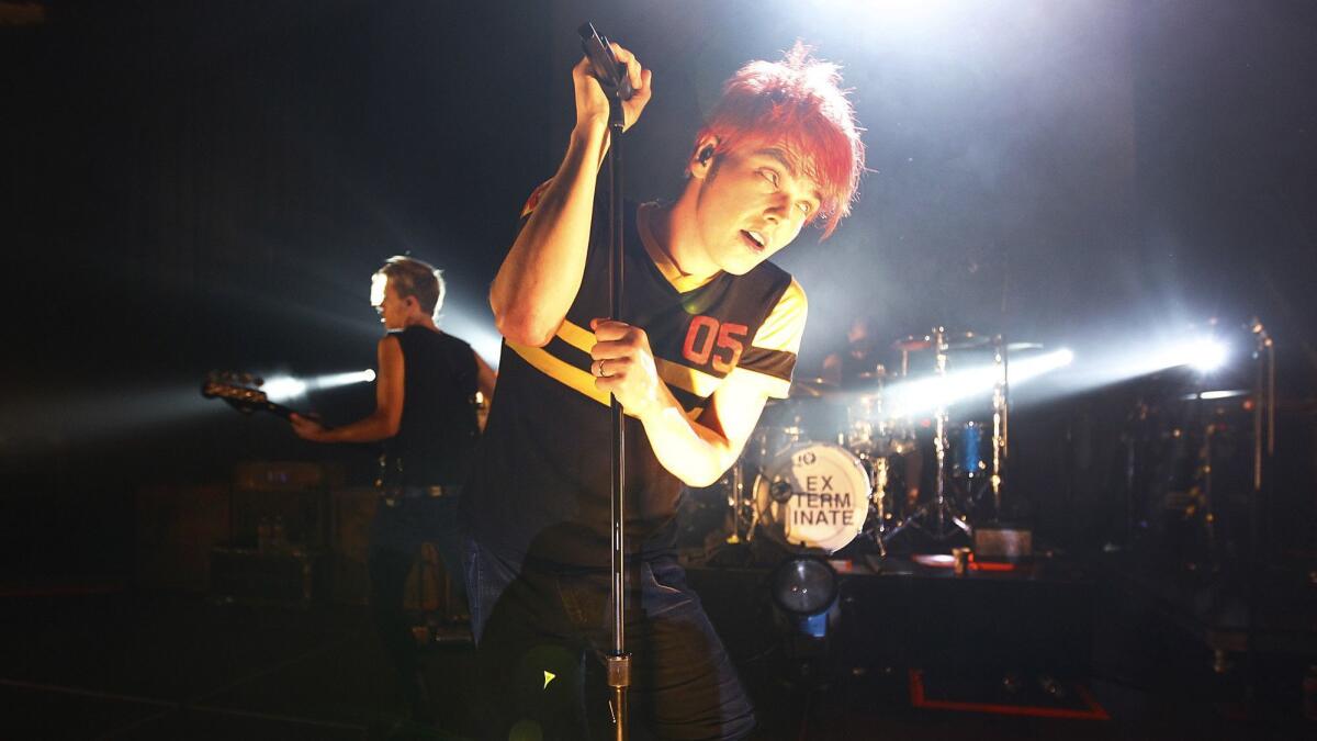 My Chemical Romance frontman Gerard Way leads the band at the Hollywood Palladium in 2011.