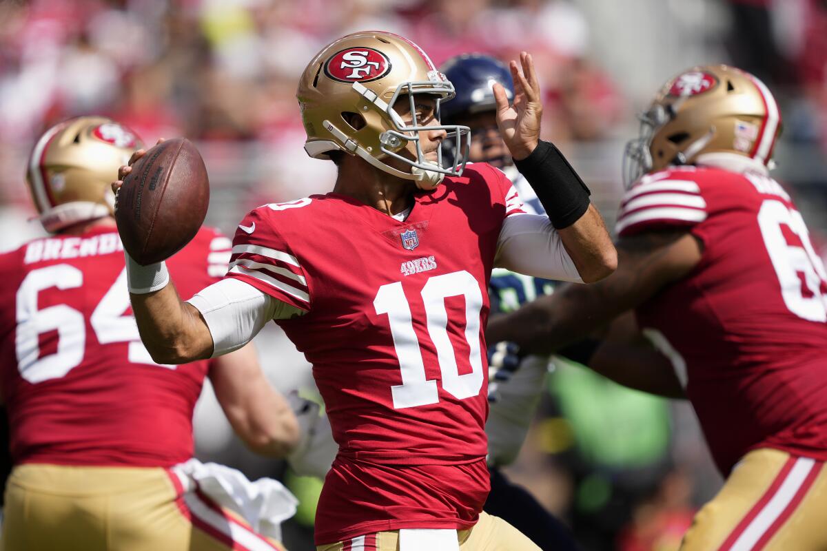 Jimmy Garoppolo carted off with injury in 49ers vs. Dolphins