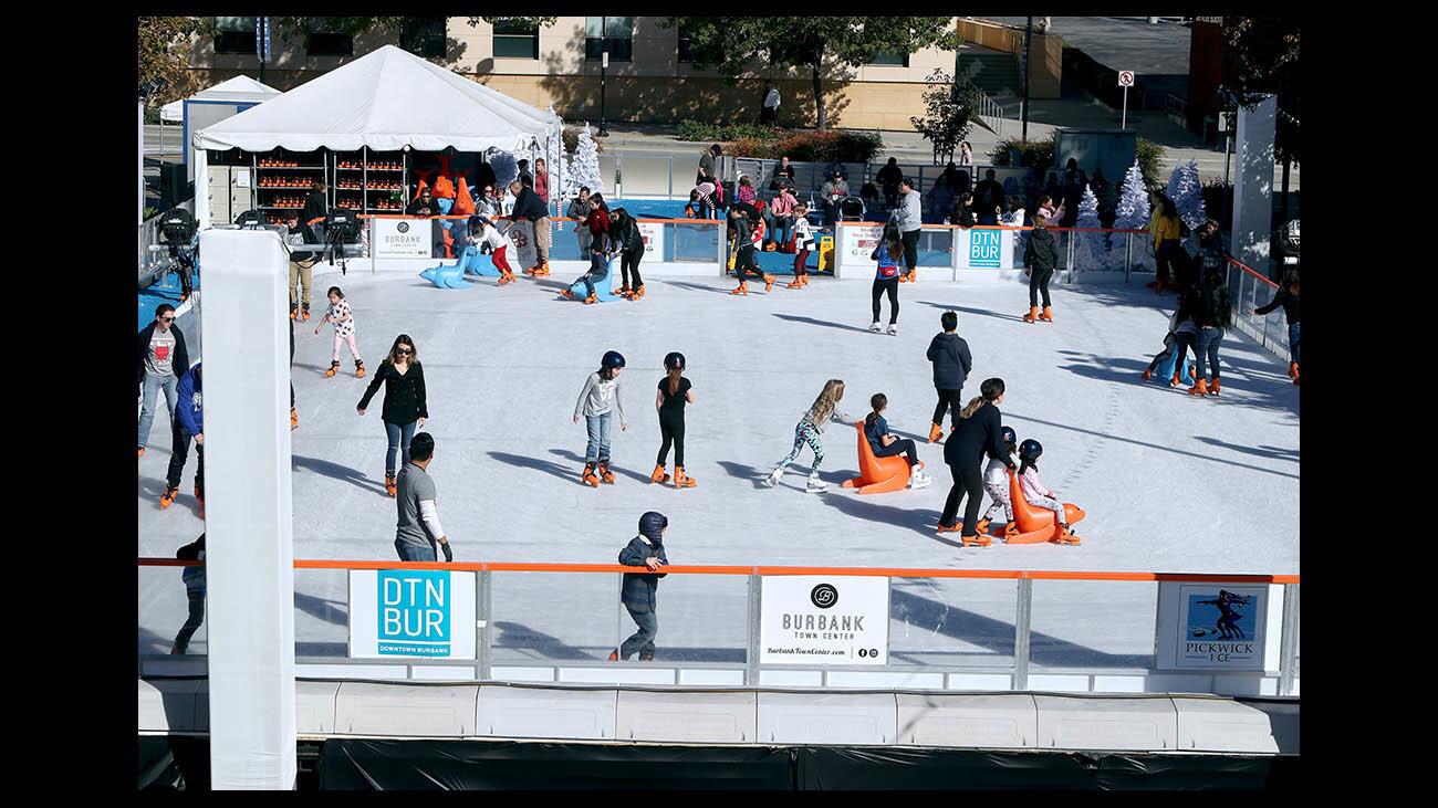 Photo Gallery: Annual Ice America ice skating rink opens to public in Burbank