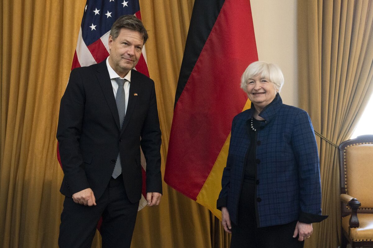 Secretary of the Treasury Janet Yellen greets German Economy and Climate Minister and Vice Chancellor Robert Habeck, at the U.S. Treasury Department in Washington, Tuesday, March 1, 2022. (AP Photo/Manuel Balce Ceneta)