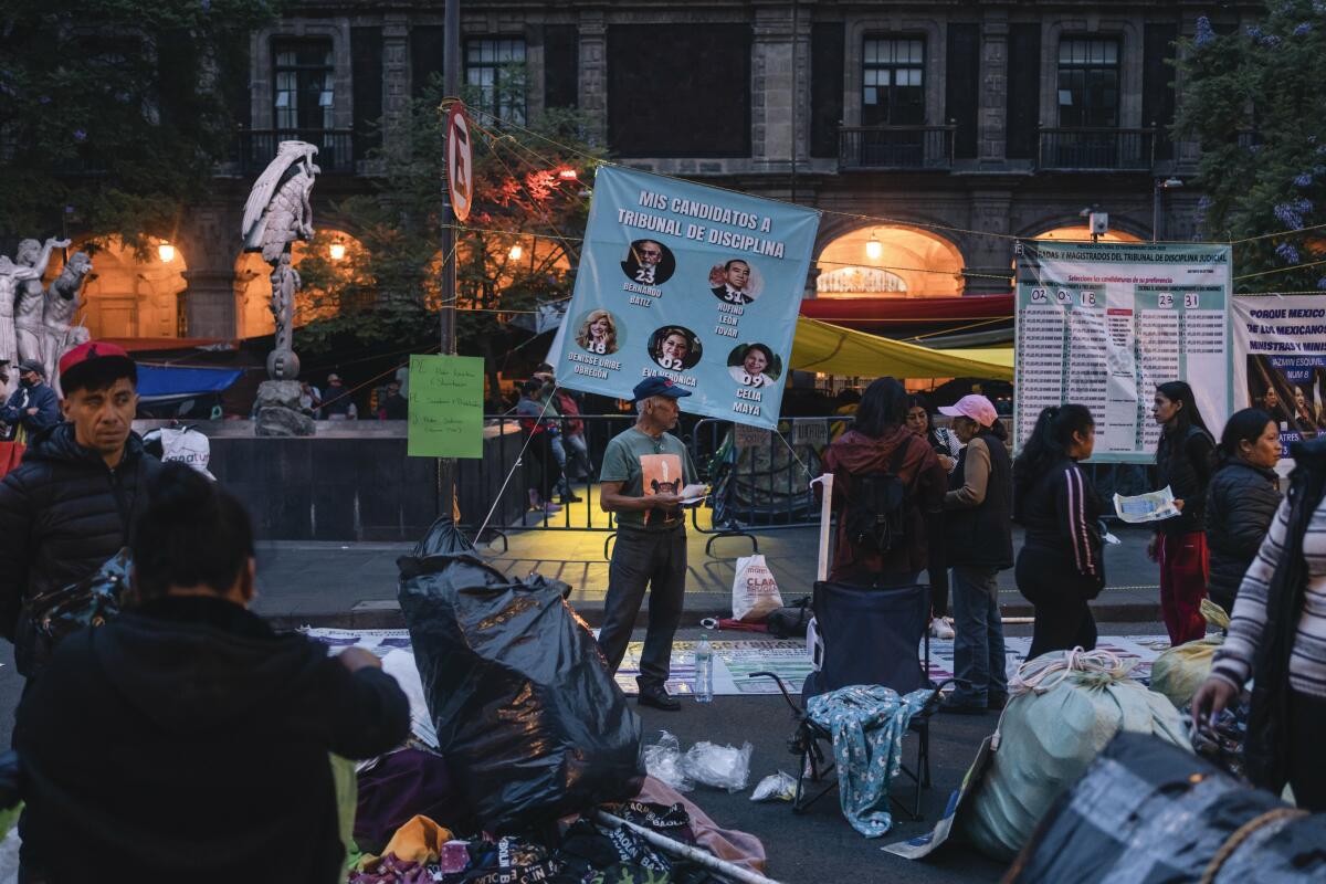 Supporters promote candidates for Mexico's judicial elections in Mexico City on May 28.