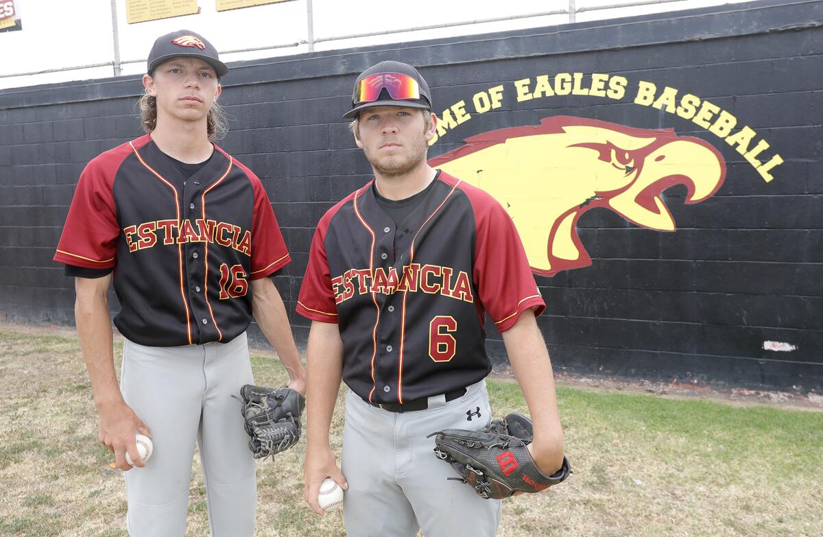 Pitchers Andrew Mits and Trevor Scott, from left, have combined for 19 wins for the Estancia High baseball team this season.