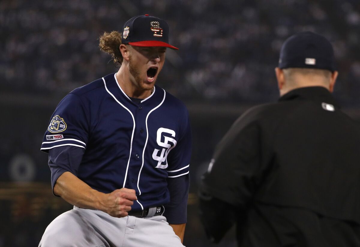 Chris Paddack reacts after getting the final out of the fifth inning with the bases loaded in Saturday's game against the Dodgers.