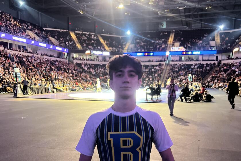 Henry Aslikyan of Birmingham won the 113-pound state wrestling championship.
